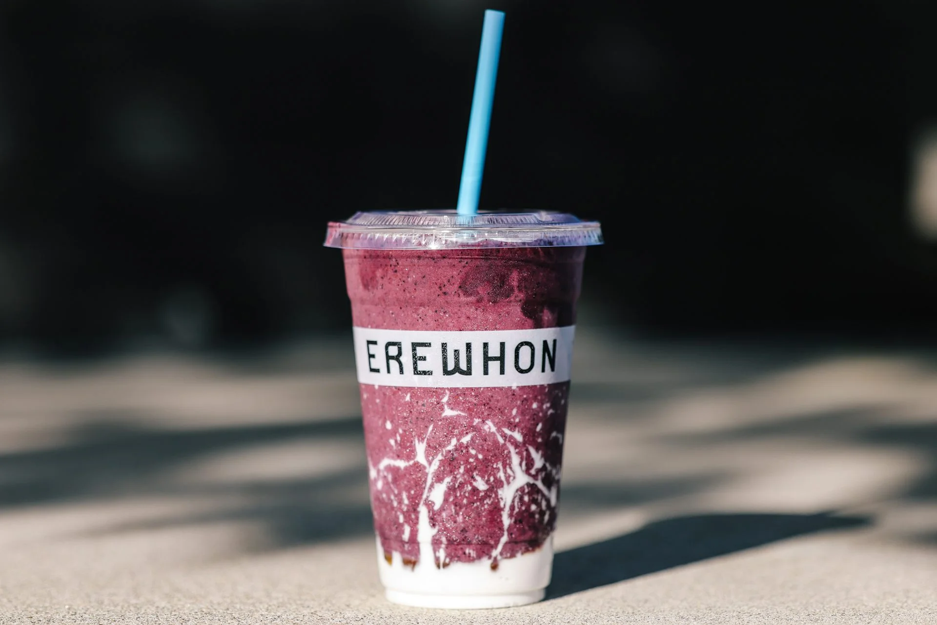 A photo of a chilled Erewhon smoothie that includes kefir, blueberries, honey, raw beef, bananas, sea salt and maple syrup.